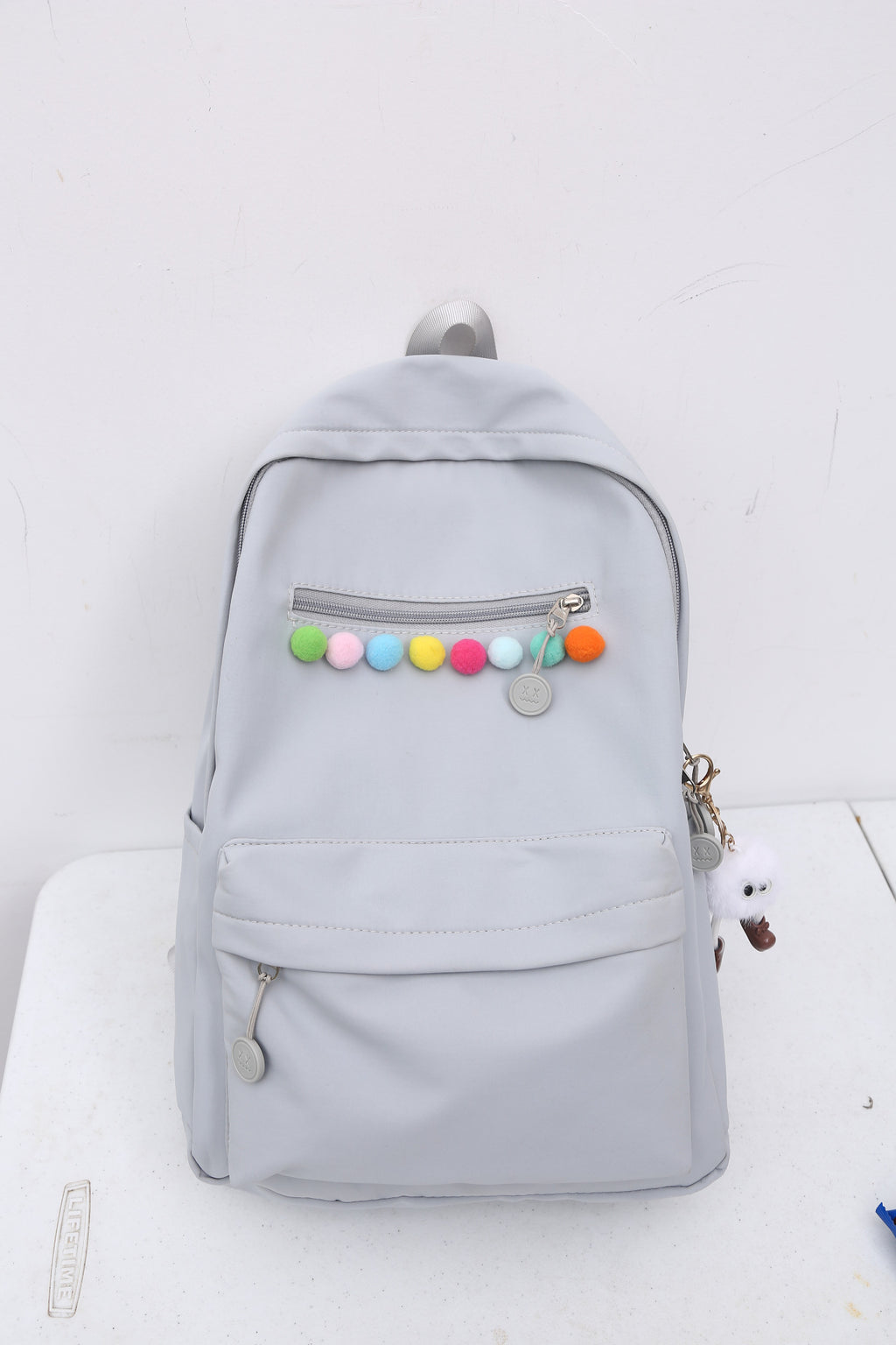 Practical backpack with colorful applications