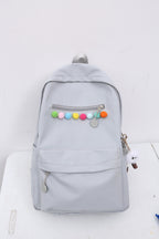 Practical backpack with colorful applications