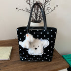 Plush shoulder bag with playful dog motif