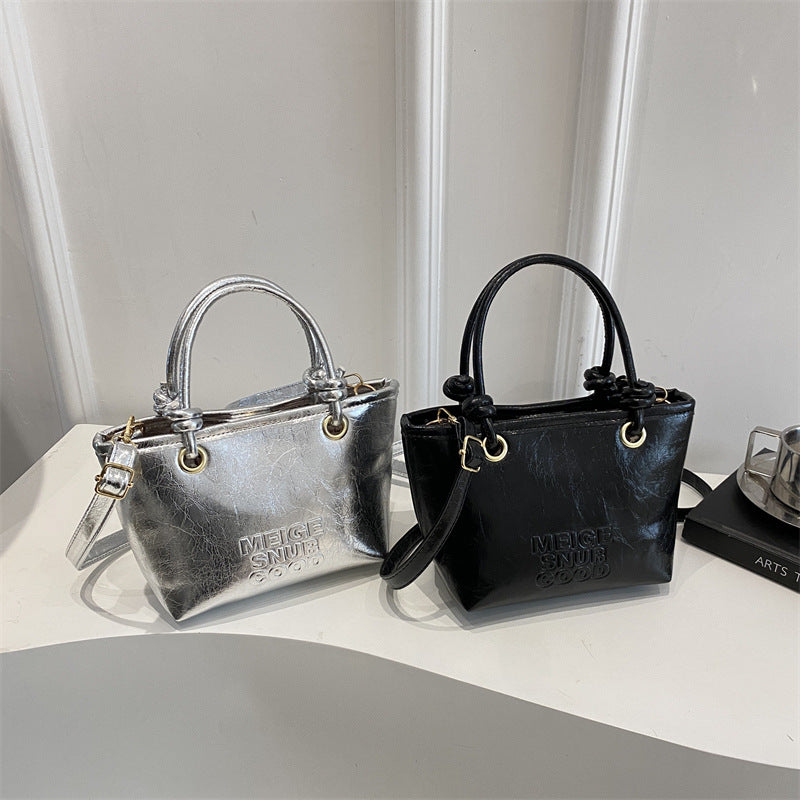 Women elegant mini handbag with structured design and removable shoulder strap