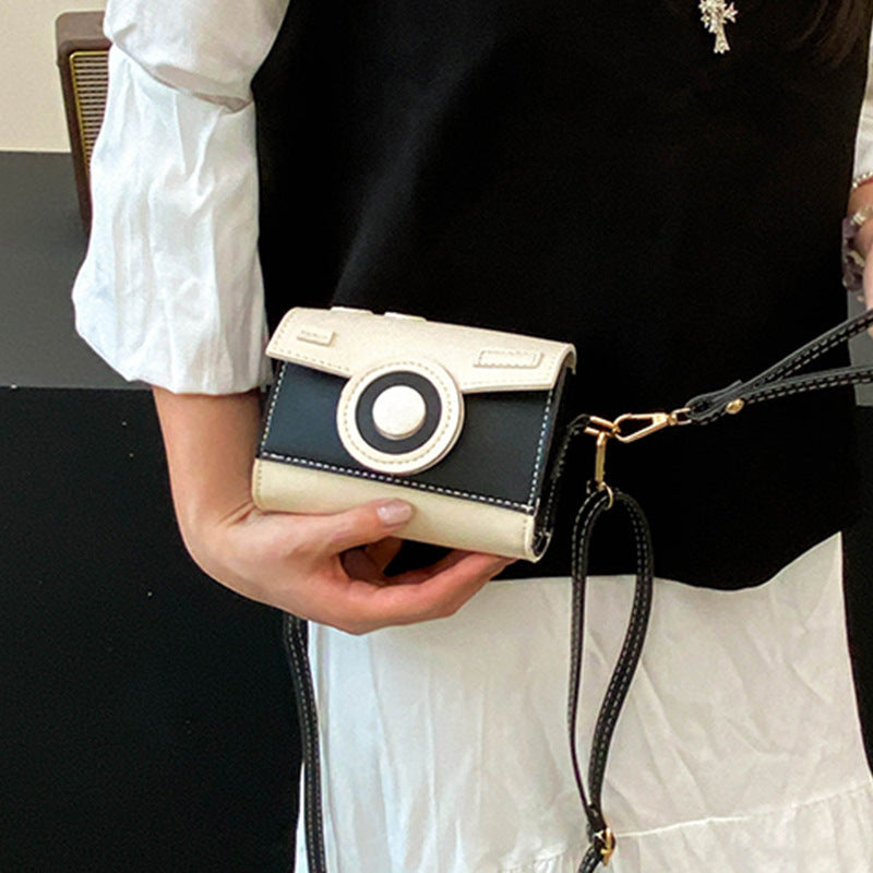 Women’s mini handbag with playful flap closure