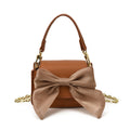 Ladies mini handbag with decorative bow design