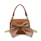 Ladies mini handbag with decorative bow design