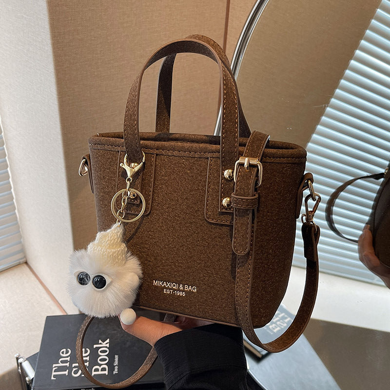 Women’s mini bag with detachable plush pendant