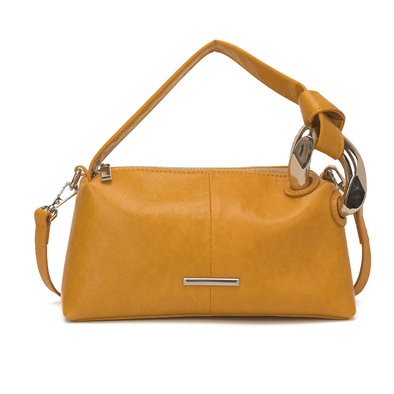 Ladies elegant handbag with minimalist design and noble accents