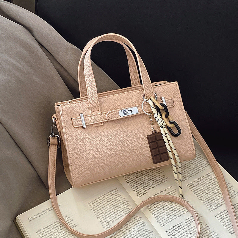 Ladies elegant mini bag with detachable pendant