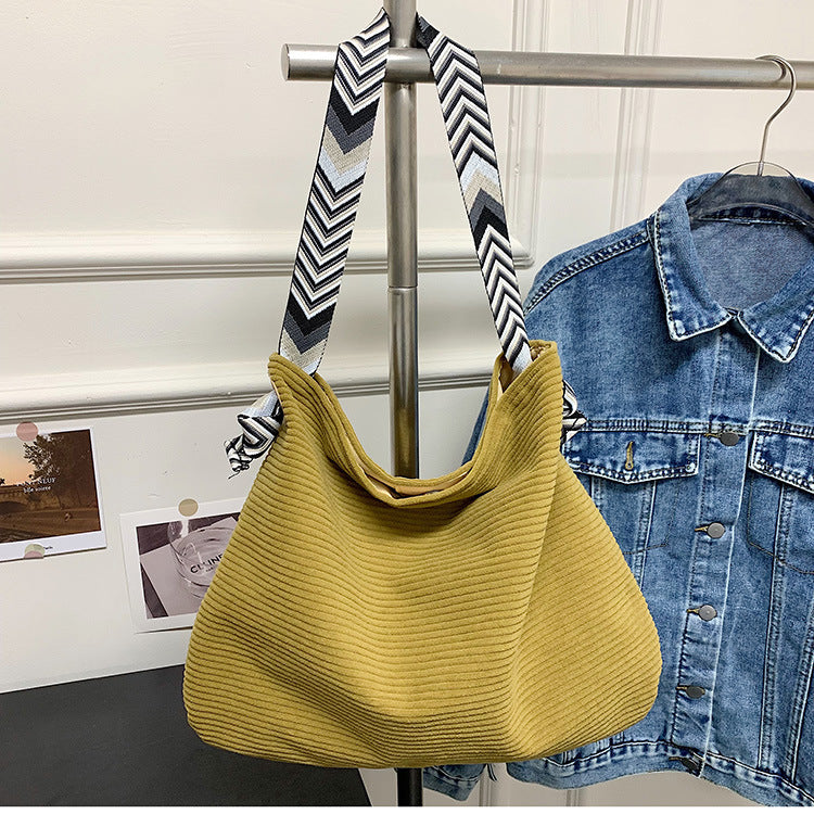 Casual shopper bag with fashionable shoulder strap