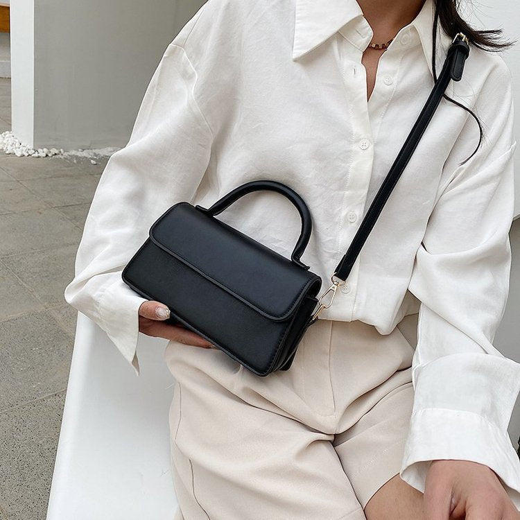 Ladies elegant shoulder bag with detachable carrying strap