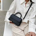 Ladies elegant shoulder bag with detachable carrying strap
