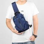 Sling backpack with multiple compartments