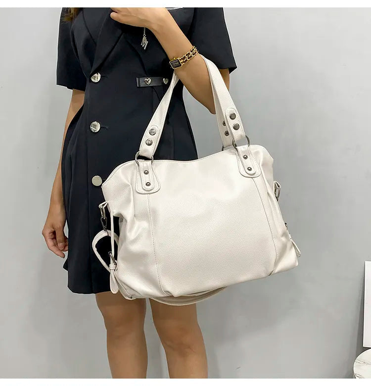 large women's tote bag made of faux leather with zipper