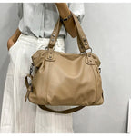 large women's tote bag made of faux leather with zipper