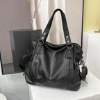 large women's tote bag made of faux leather with zipper