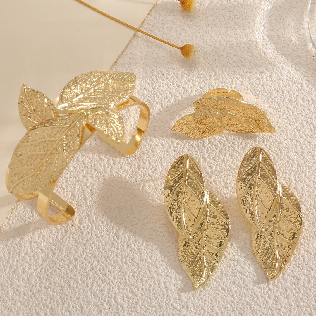 Ladies' bangle with artistic leaf design Calm Wears-https://detail.1688.com/offer/961340359938.html-Calm Wears-Gold-Calm Wears
