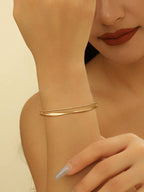 Ladies' bangle with elegant curved design Calm Wears-https://detail.1688.com/offer/825473621801.html-Calm Wears-Gold-Calm Wears