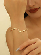 Ladies' bangle with elegant curved design Calm Wears-https://detail.1688.com/offer/825473621801.html-Calm Wears-Gold-Calm Wears