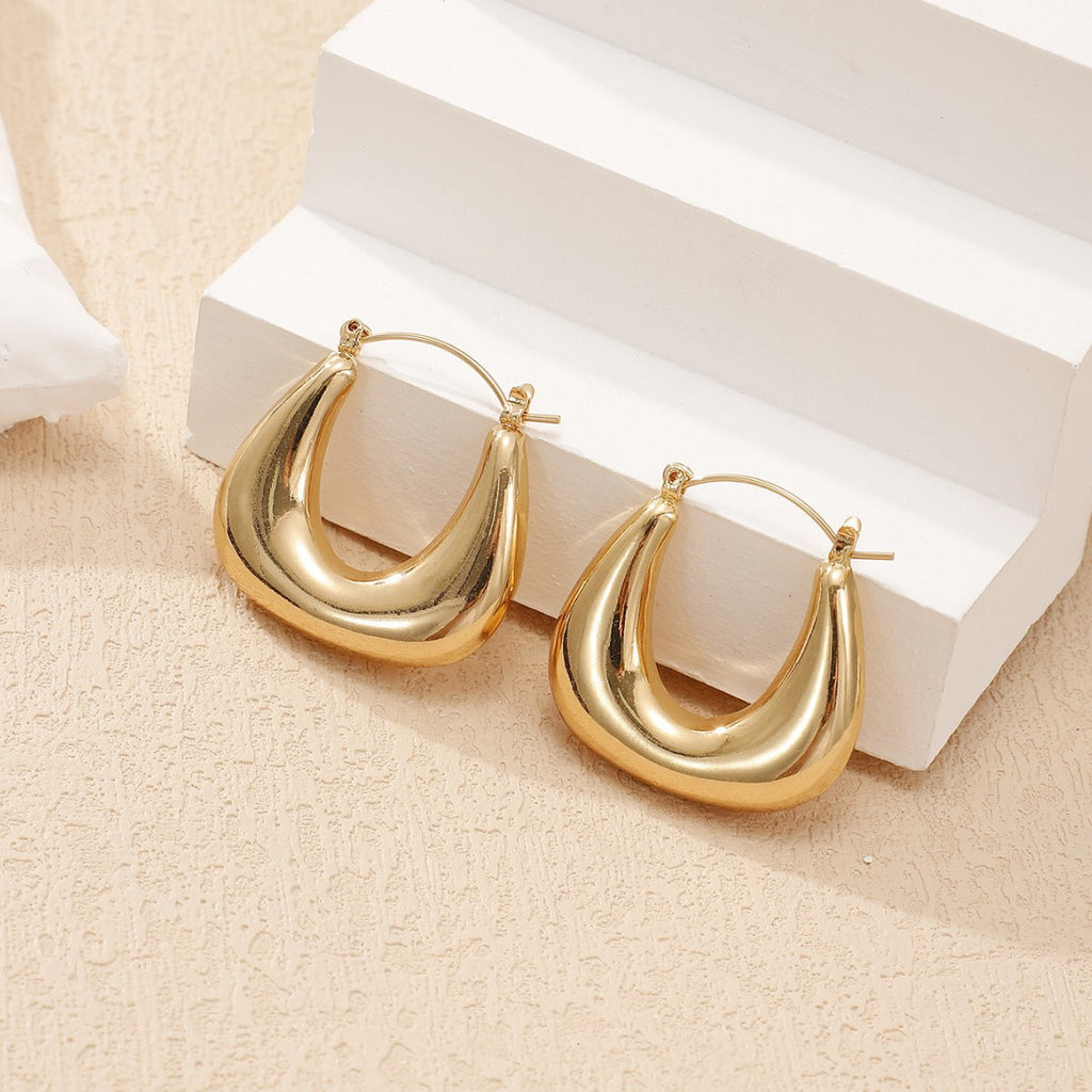 Ladies earrings in a modern, curved design Calm Wears-https://detail.1688.com/offer/806359897796.html-Calm Wears-Gold yellow-Calm Wears