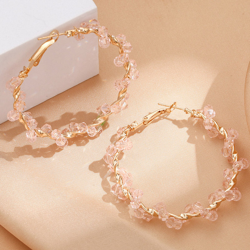 Ladies hoop earrings with luxurious pearl accents and elegant, twisted design Calm Wears-https://detail.1688.com/offer/729279634937.html-Calm Wears-Kristall-Calm Wears