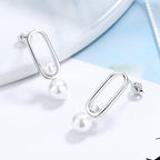 Women's stud earrings with modern oval design and elegant pearls Calm Wears-https://detail.1688.com/offer/673851833990.html-Calm Wears-Platinum-925-Calm Wears