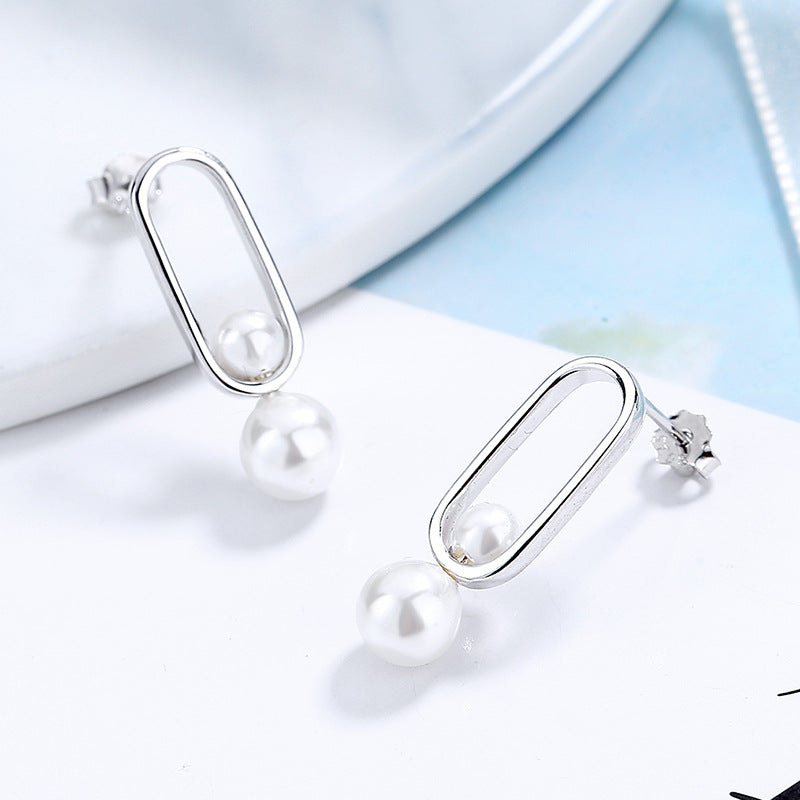Women's stud earrings with modern oval design and elegant pearls Calm Wears-https://detail.1688.com/offer/673851833990.html-Calm Wears-Platinum-925-Calm Wears